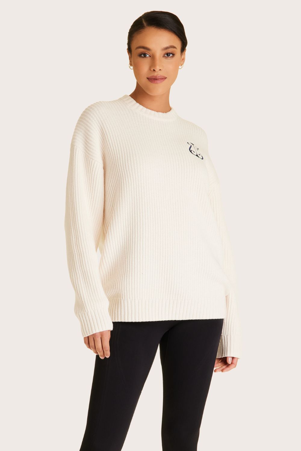 Alala women's white knit sweater with navy embroidered logo