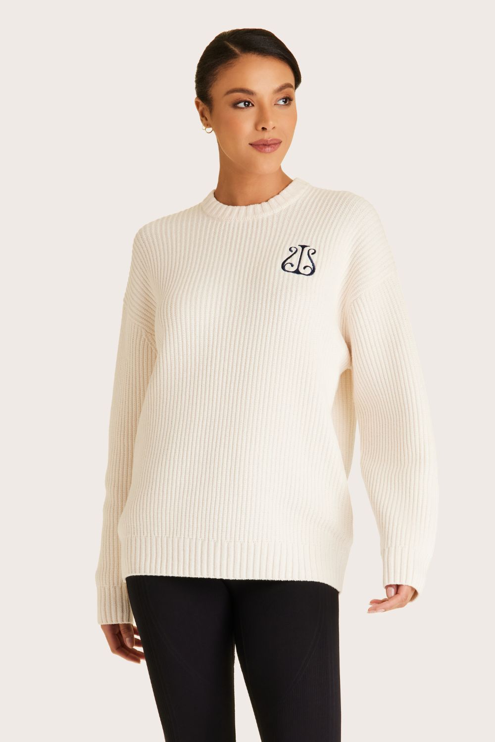 Alala women's white knit sweater with navy embroidered logo