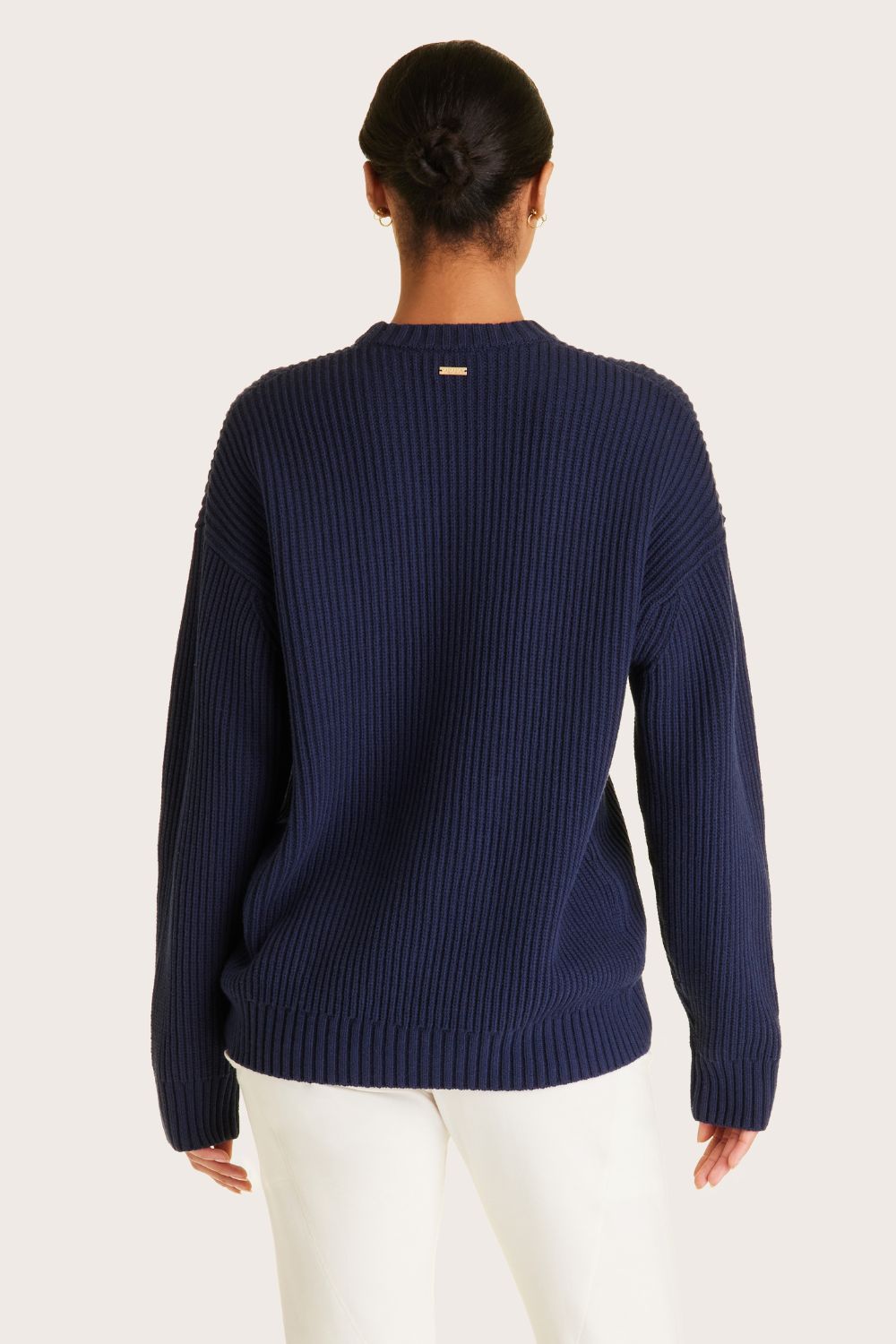 Alala women's navy knit sweater with white embroidered logo
