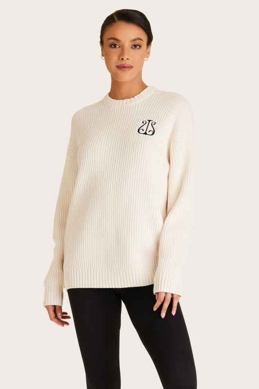 Alala women's white knit sweater with navy embroidered logo