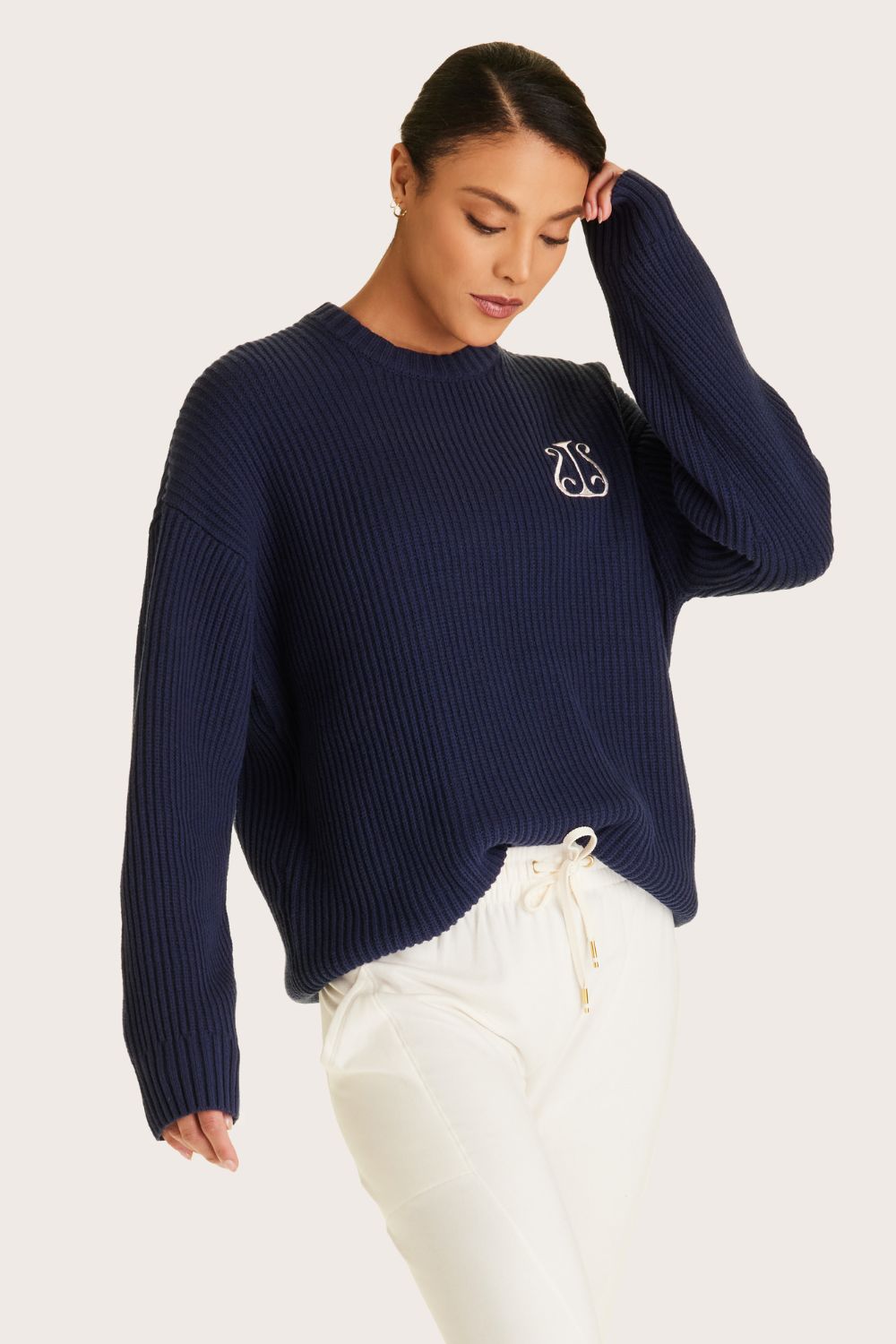 Alala women's navy knit sweater with white embroidered logo