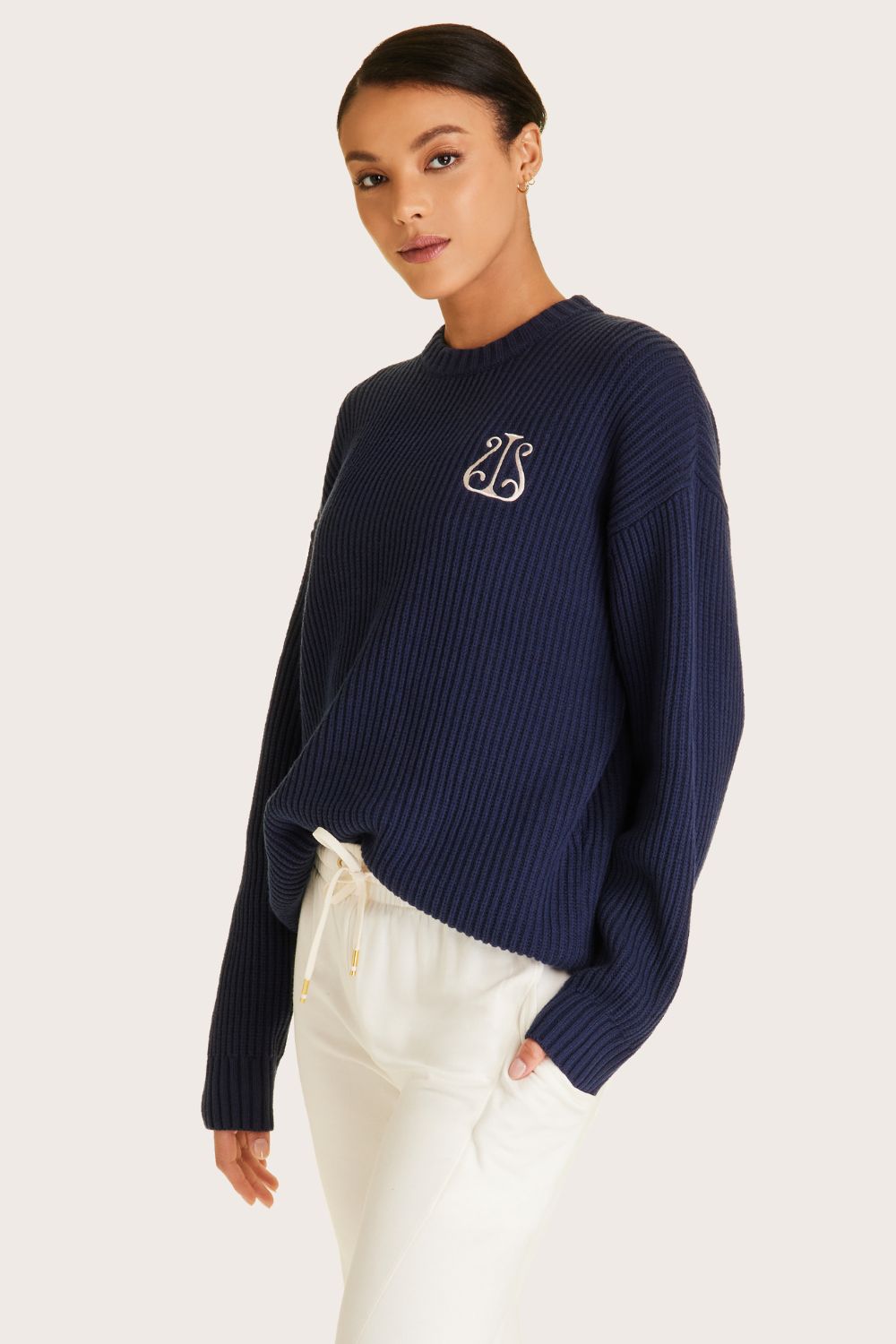 Alala women's navy knit sweater with white embroidered logo