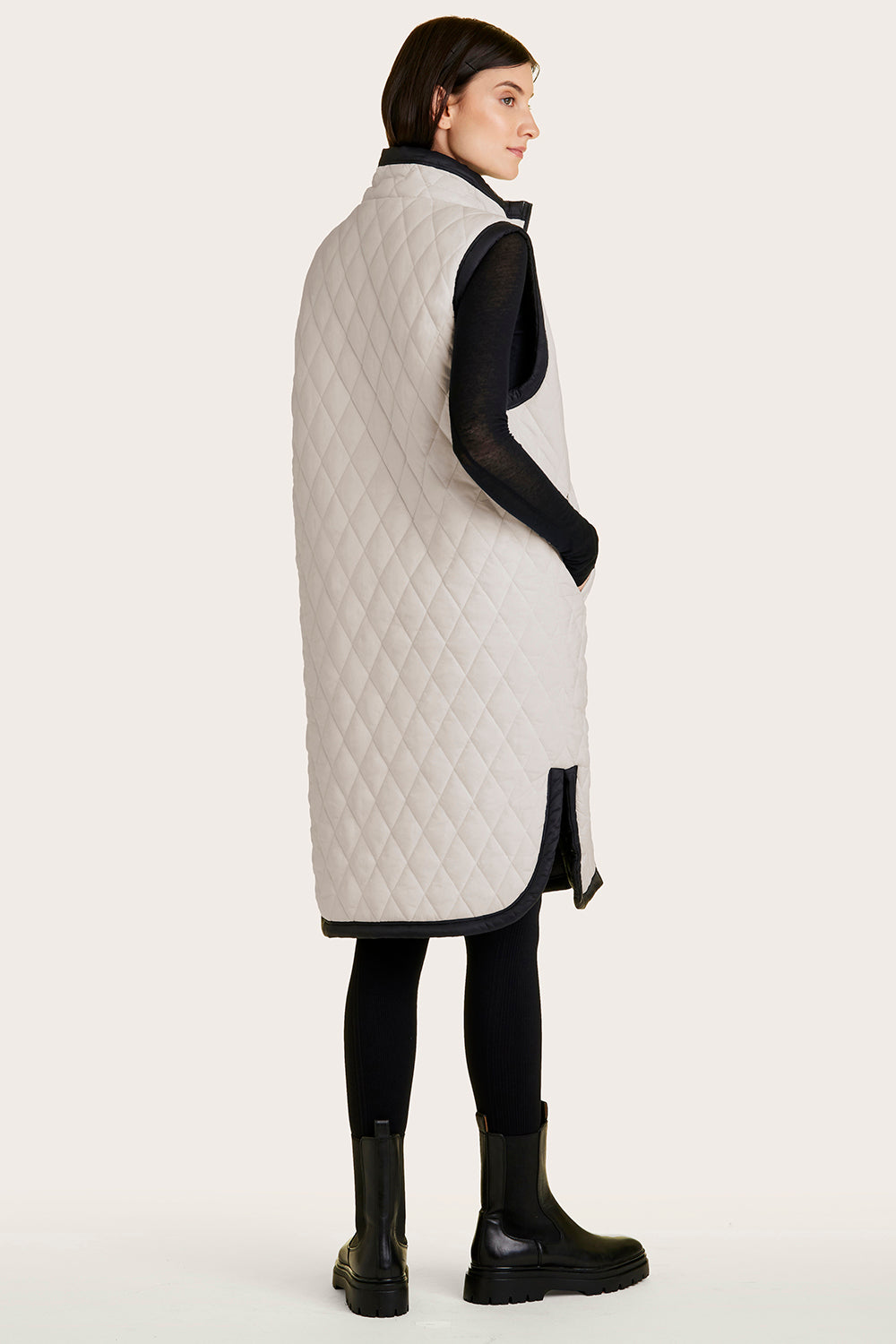Alala women's long reversible vest in black and white
