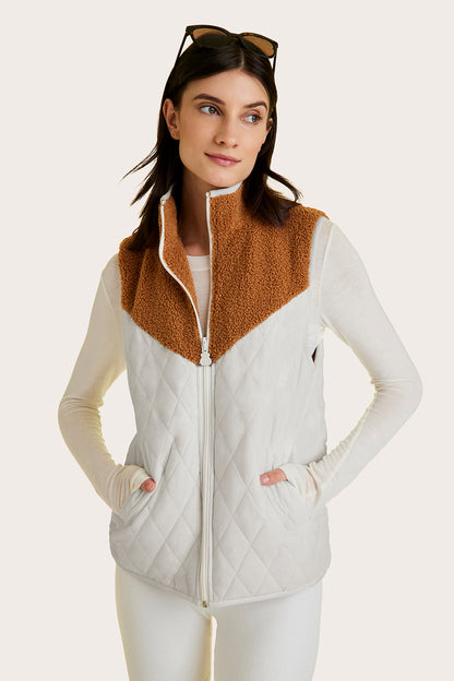Alala women's reversible sherpa vest in beige and white