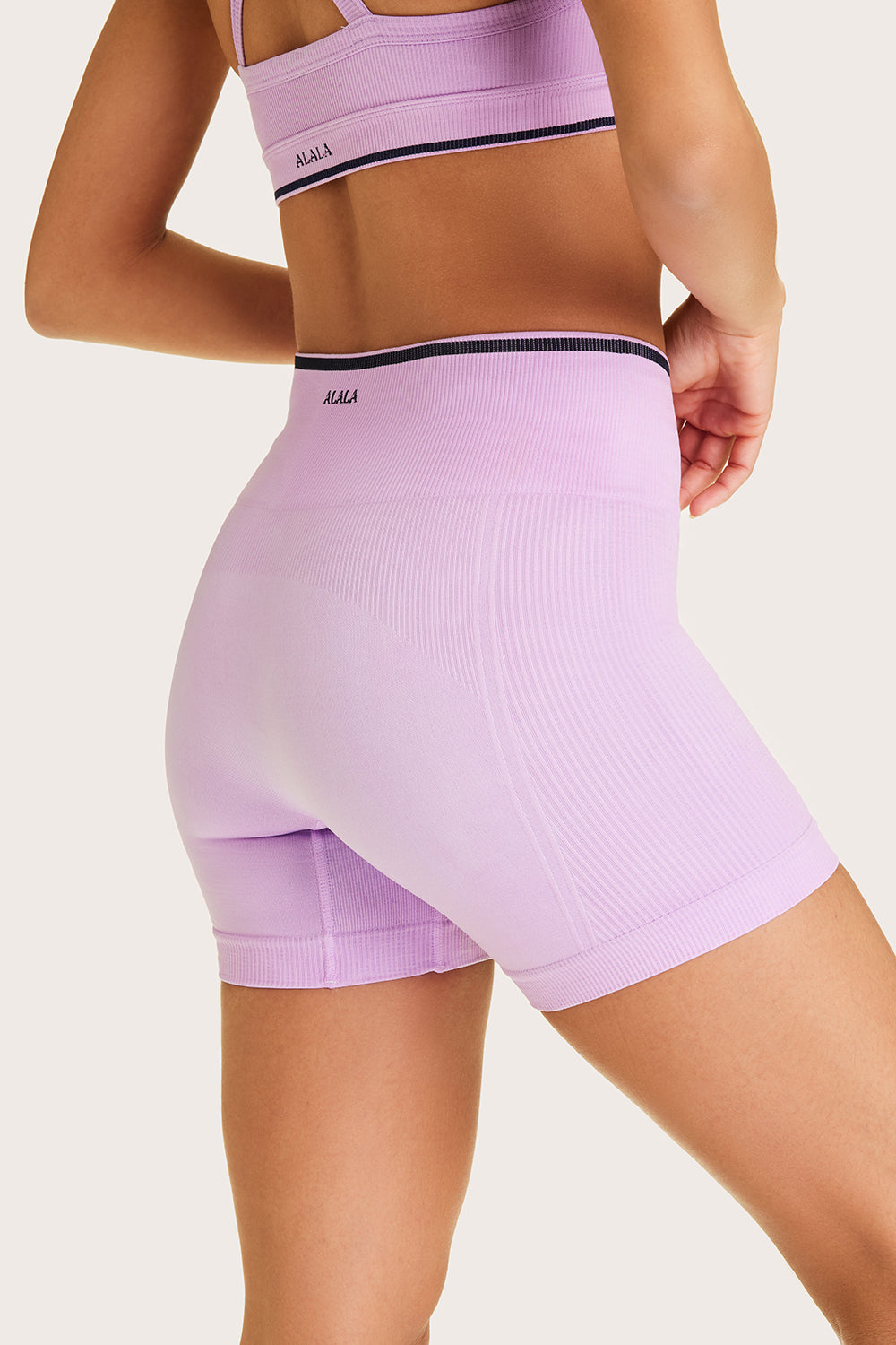 Alala women's barre seamless short in light purple