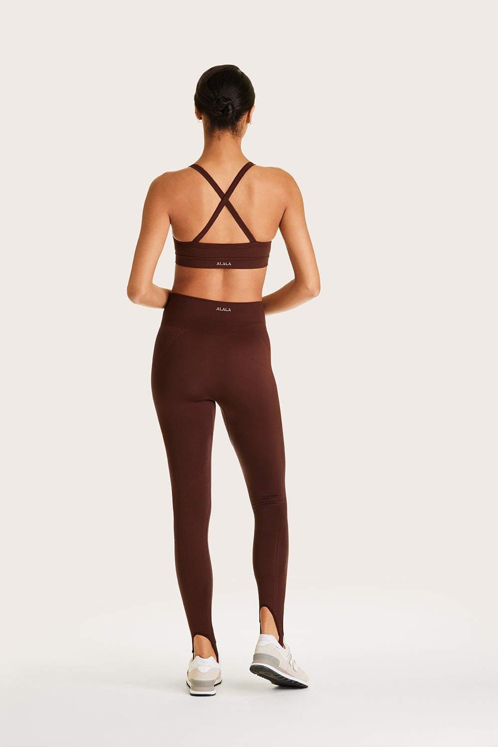 Alala women's seamless stirrup leggings in brown