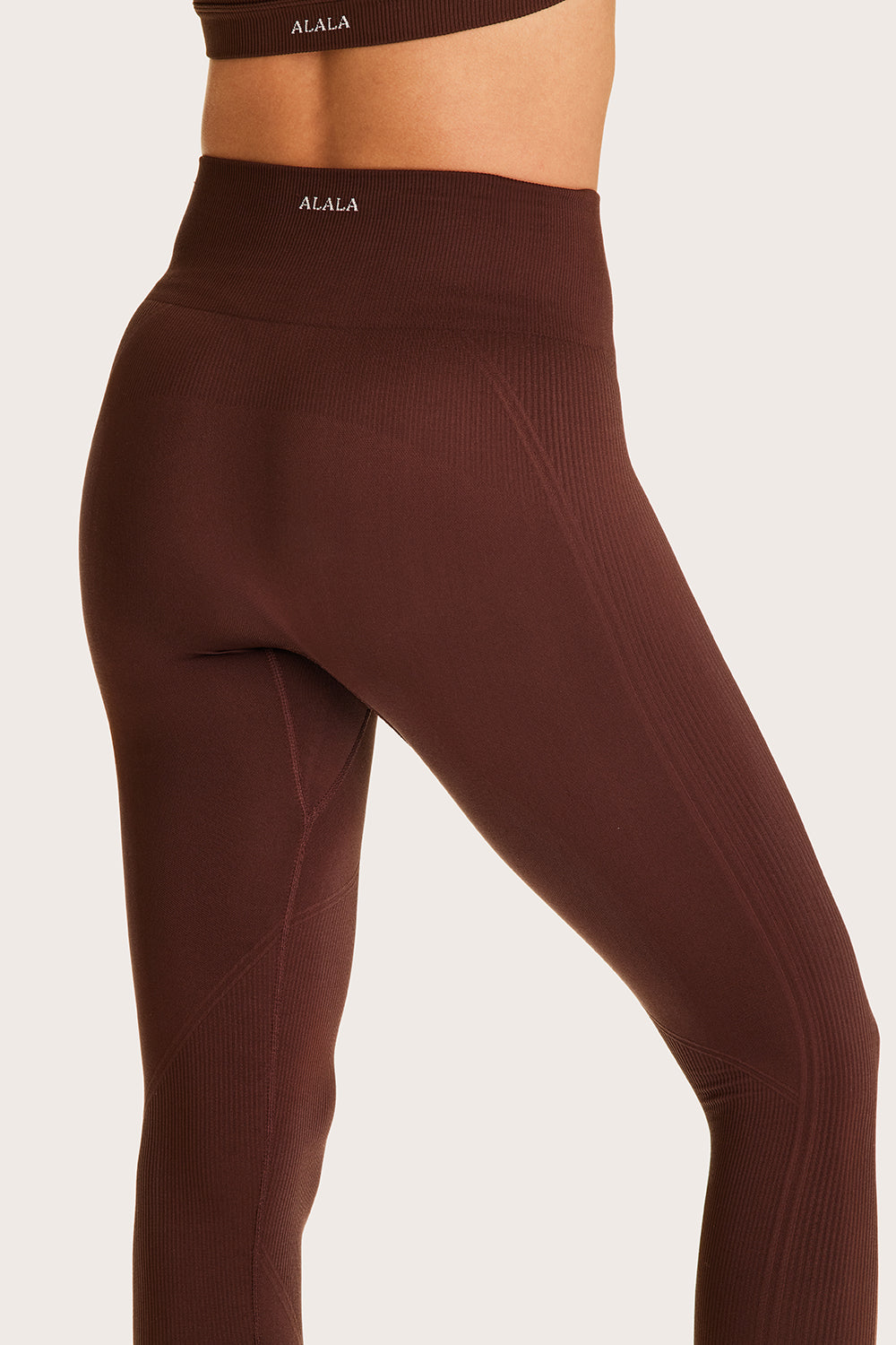 Alala women's seamless stirrup leggings in brown