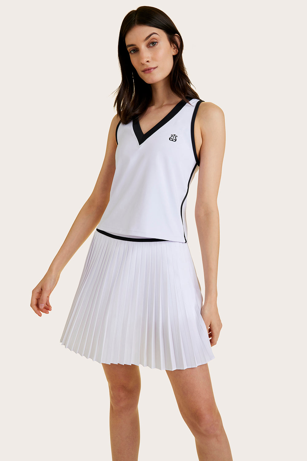 Alala women's longer length pleated tennis skort in white