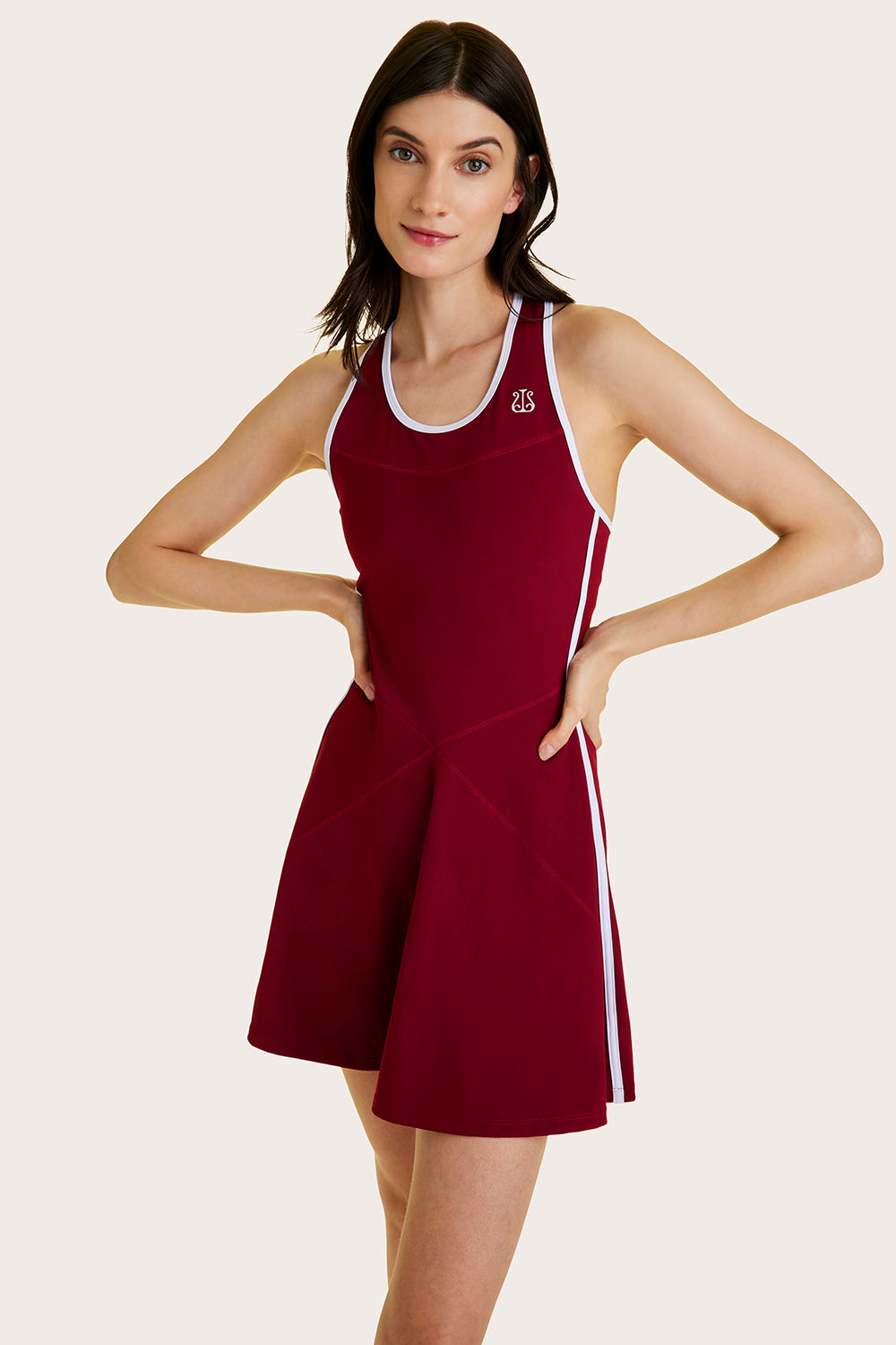 Alala women's tennis dress in dark red with white details