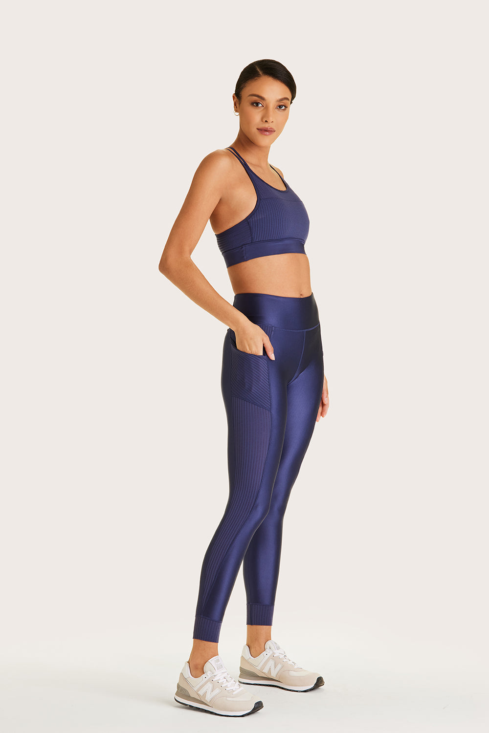 Alala women's legging with mesh panel and pocket in navy