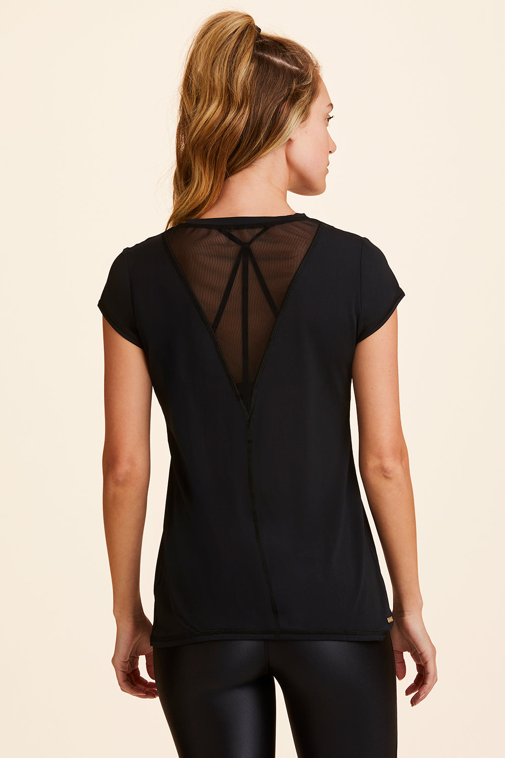 Back view of Alala Women's Luxury Athleisure blade tee in black