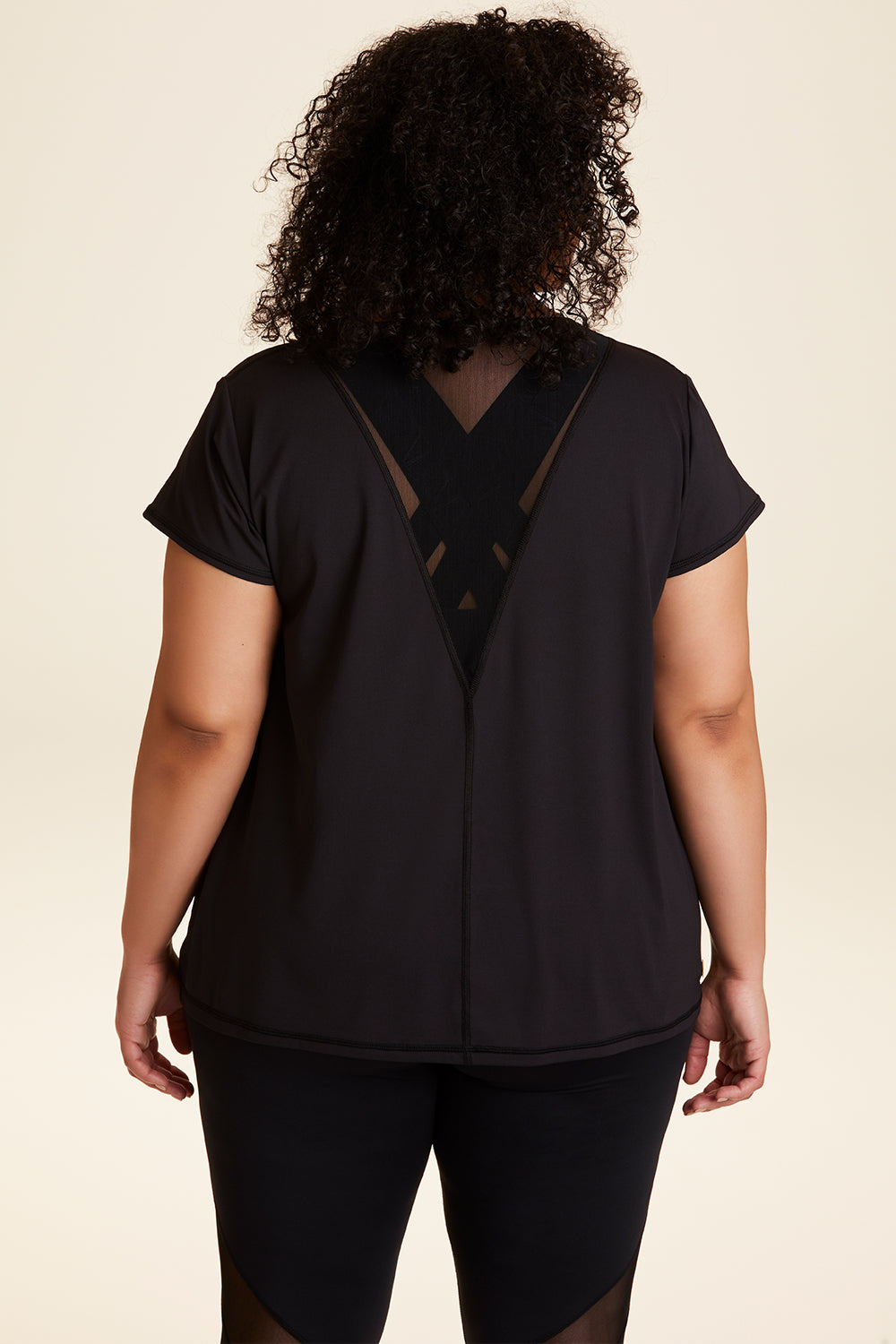 Back view of Alala Women's Luxury Athleisure blade tee in black