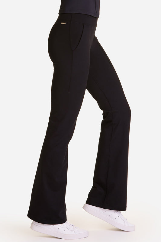 Alala women's active flare pants in black