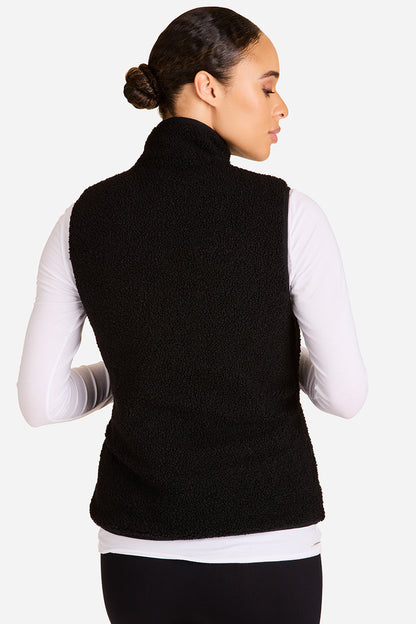 Alala reversible ski vest in black