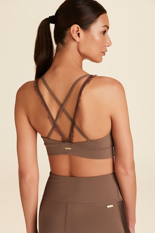 Back view of model wearing mushroom brown Ribbon Bra showing crossed mesh strap details