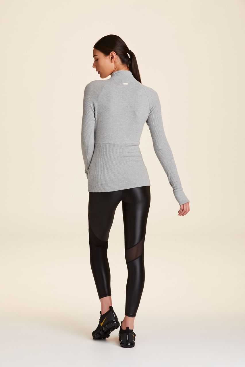 Back view of Alala Women's Luxury Athleisure super=soft quarter zip pullover