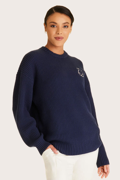Alala women's navy knit sweater with white embroidered logo