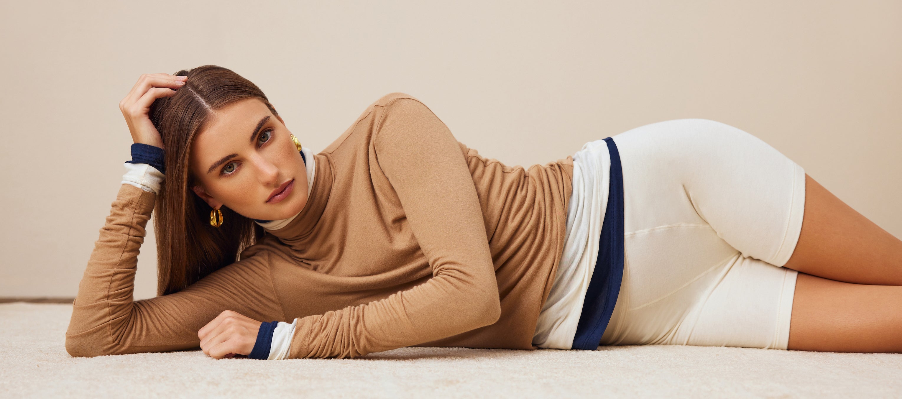 Alala's "washable cashmere tee" in camel.