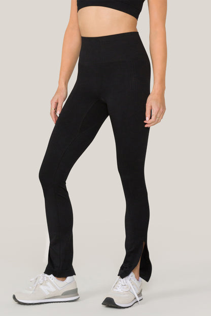 Alala women's seamless flare pant with slit in black