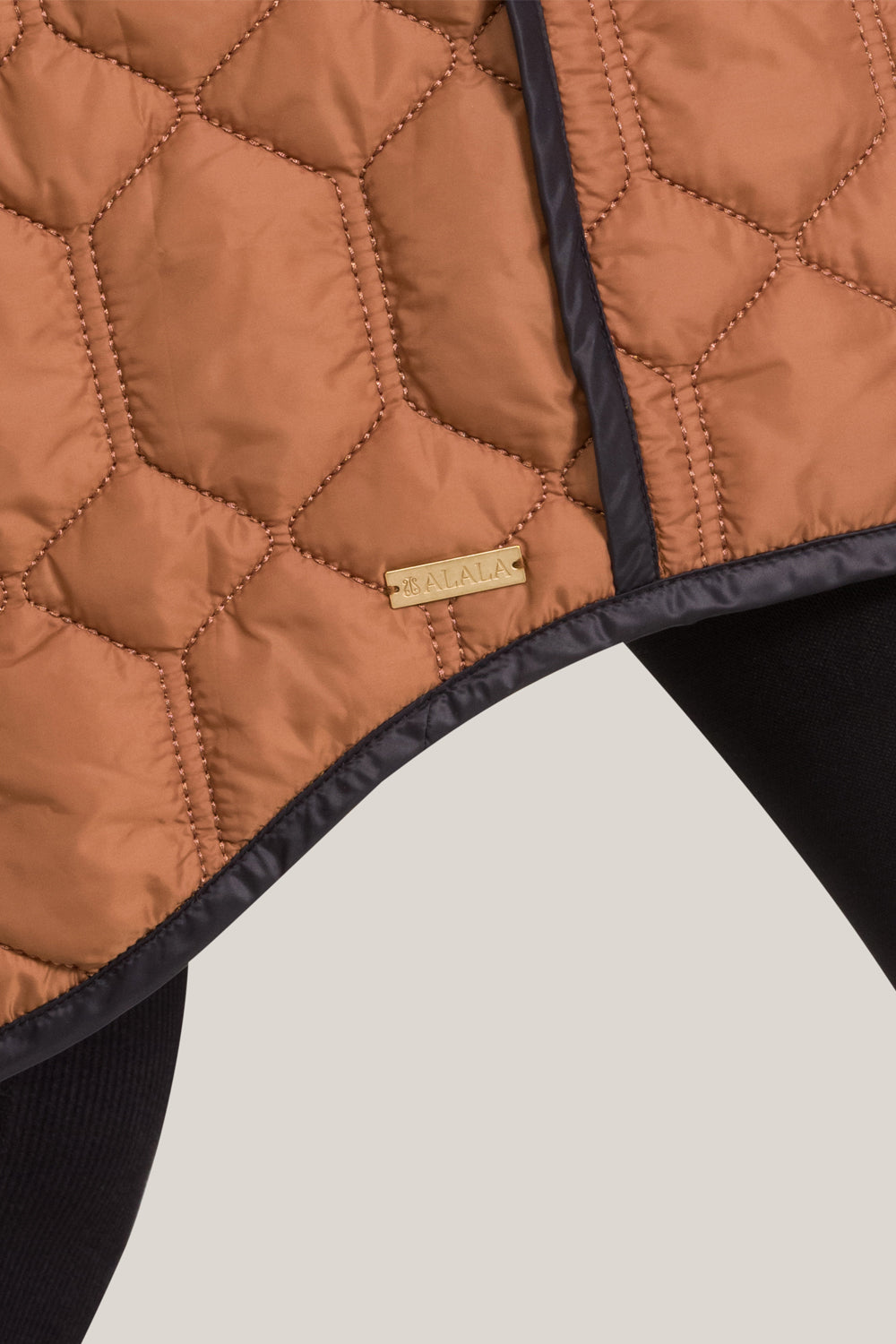 Alala women's quilted jacket in brown