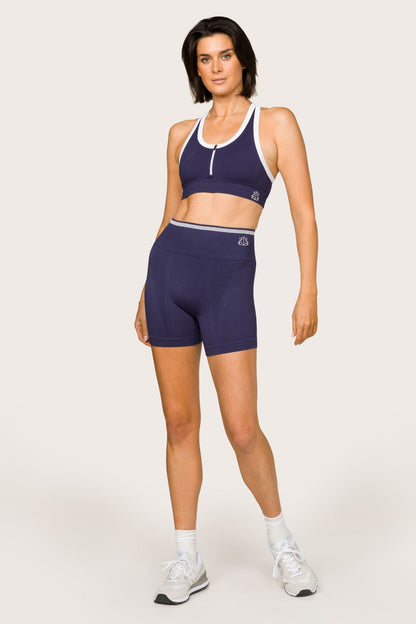 Alala women's barre seamless short in navy with white details