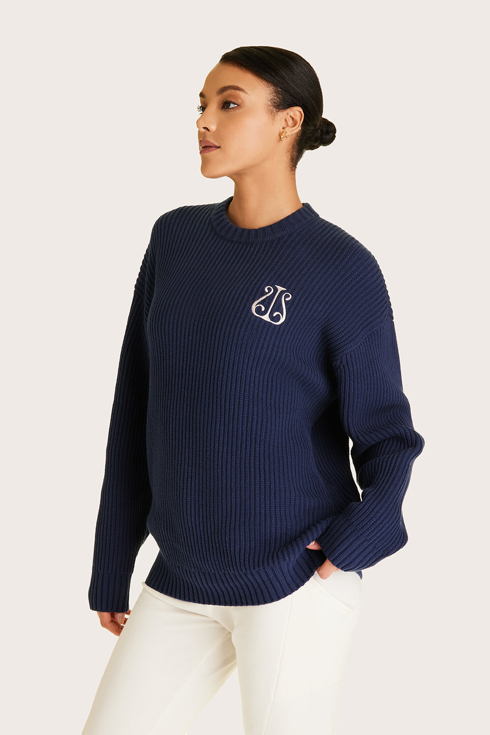 Alala women's navy knit sweater with white embroidered logo