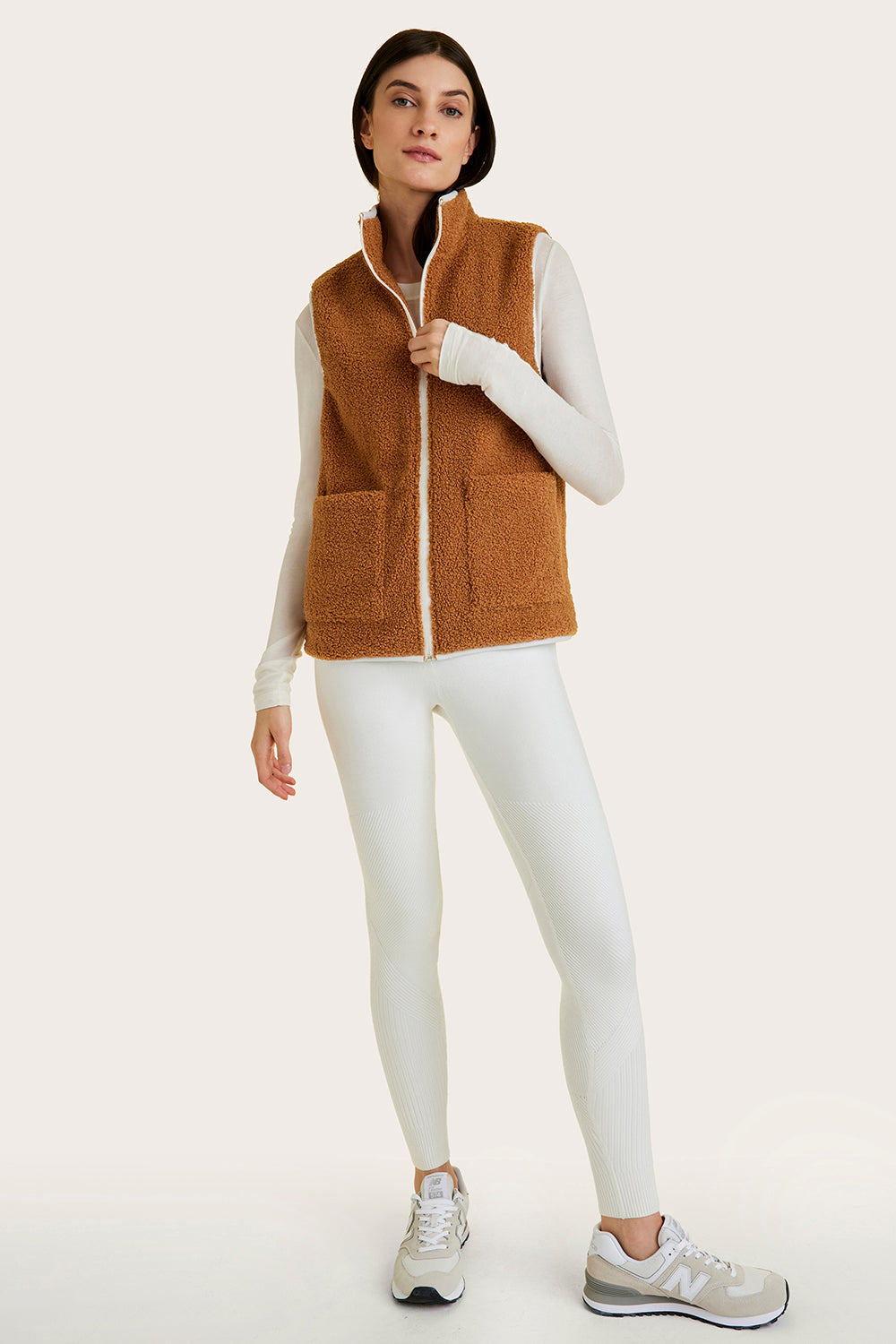 Alala women's reversible sherpa vest in beige and white