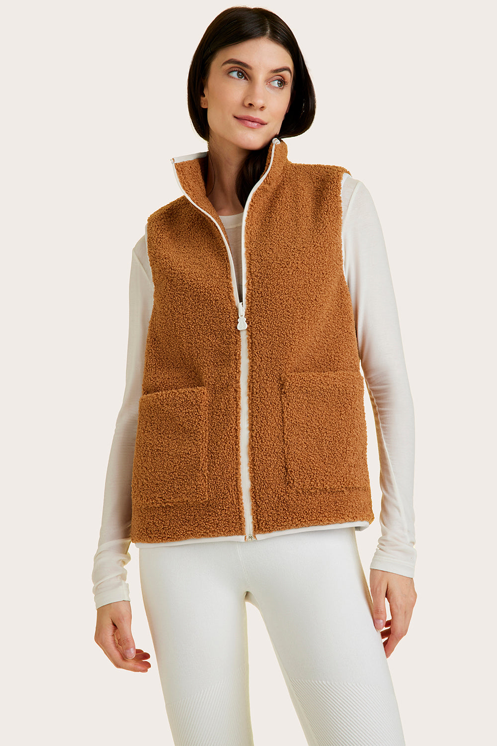 Alala women's reversible sherpa vest in beige and white