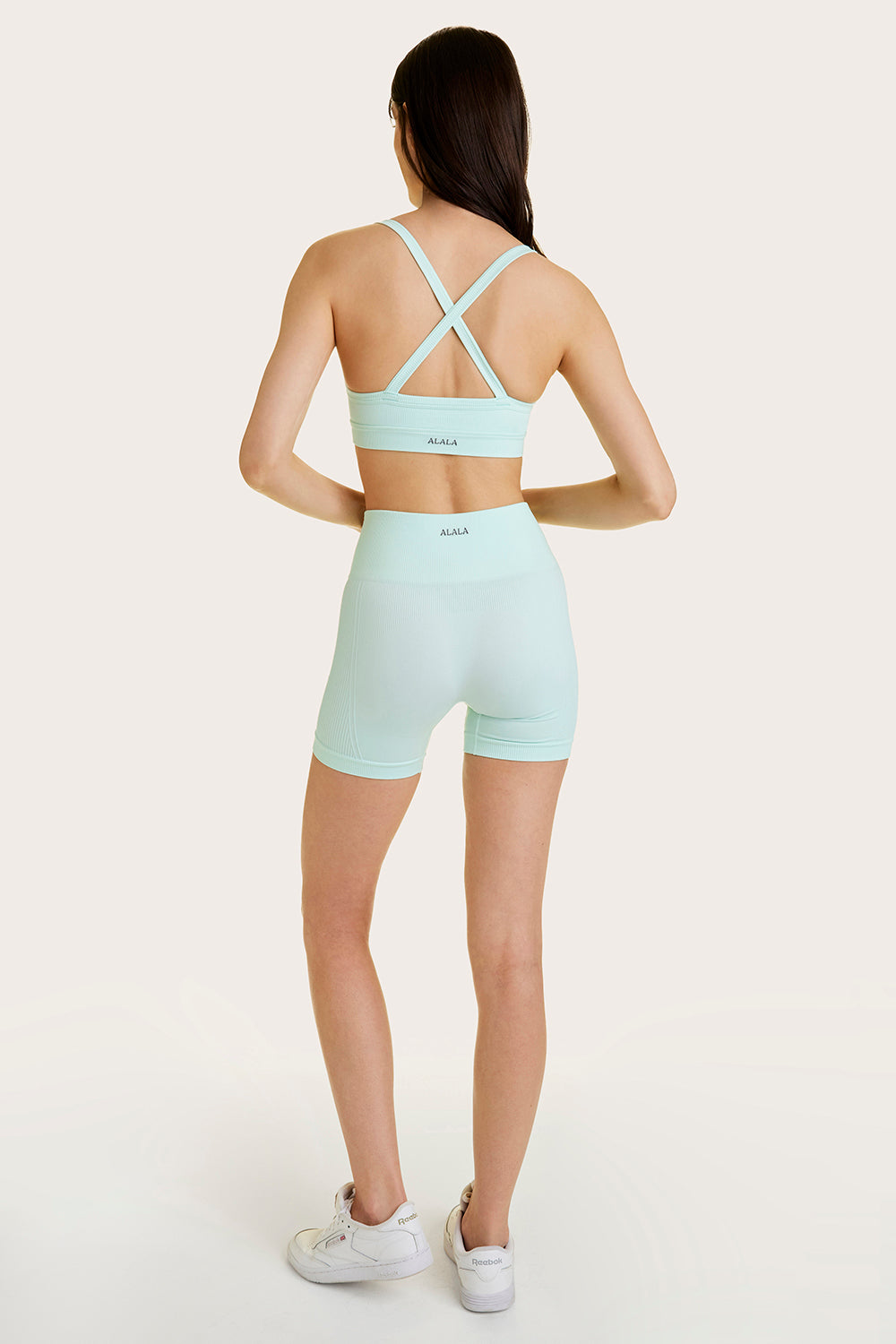 Alala women's barre seamless short in light green