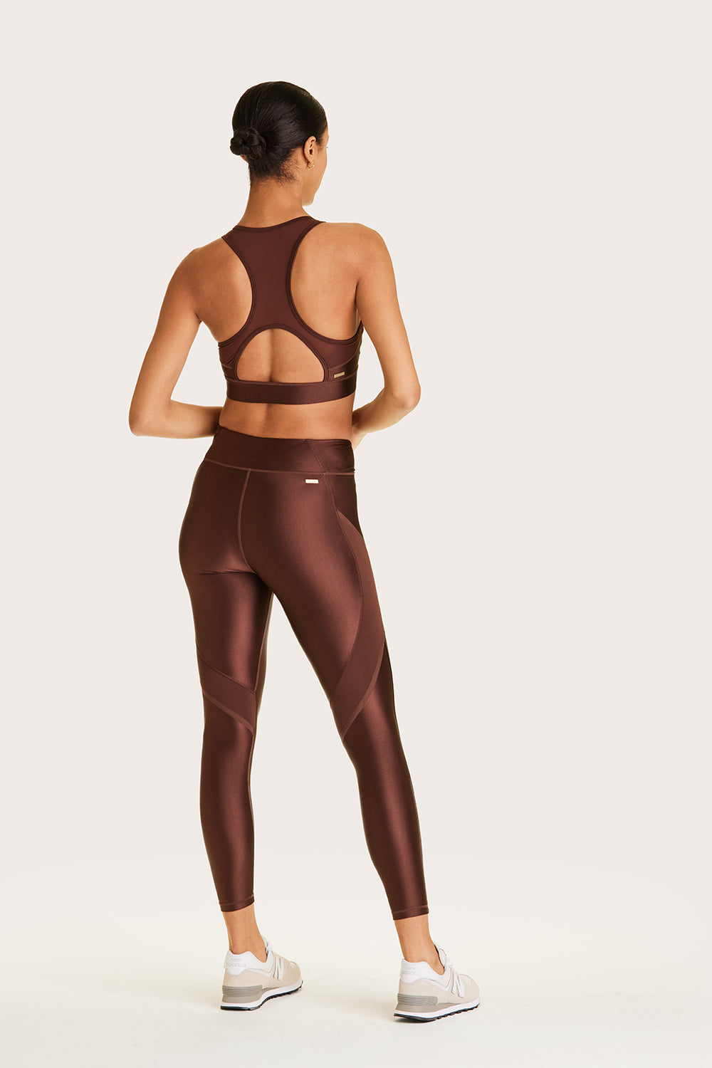 Alala women's shiny brown legging