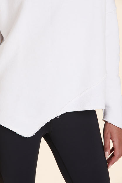Front view close-up of Alala Women's Luxury Athleisure white sweatshirt with distressed details on seams
