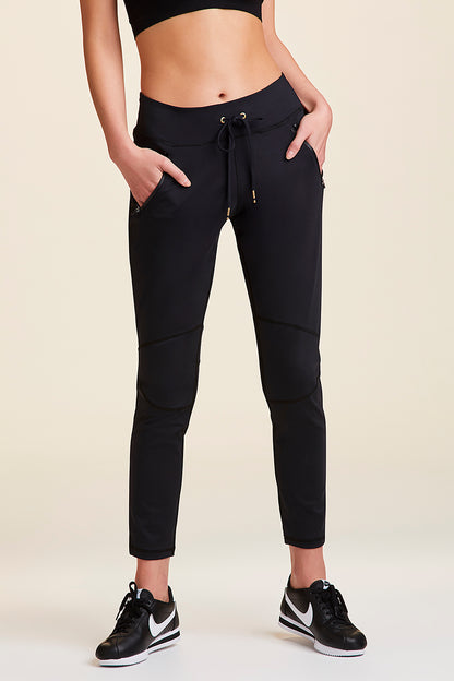 Ajile Women Solid Knee Length Black Track Pants - Selling Fast at
