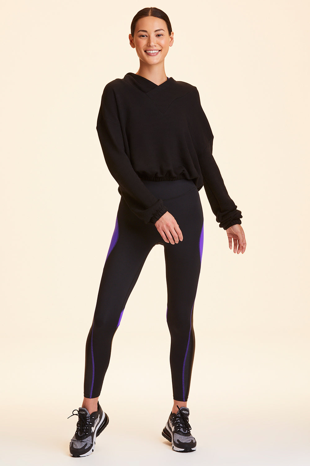 Front view of Alala Women's Luxury Athleisure black cropped sweatshirt