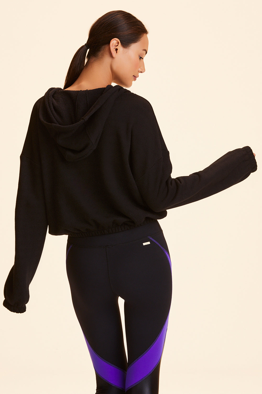 Back view of Alala Women's Luxury Athleisure black cropped sweatshirt