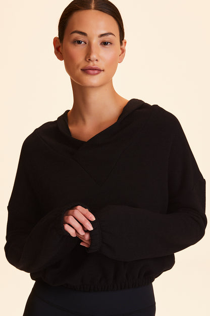 Front view of Alala Women's Luxury Athleisure black cropped sweatshirt