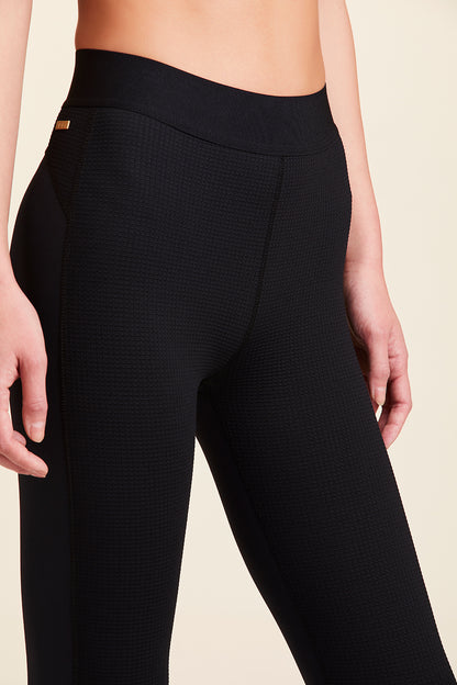 Close-up view of Alala Women's Luxury Athleisure thermal tight
