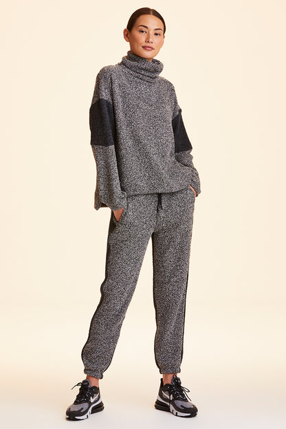 Front view of Alala Women's Luxury Athleisure heather grey marled yarn sweatpant