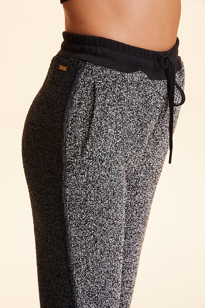 Side view of Alala Women's Luxury Athleisure heather grey marled yarn sweatpant