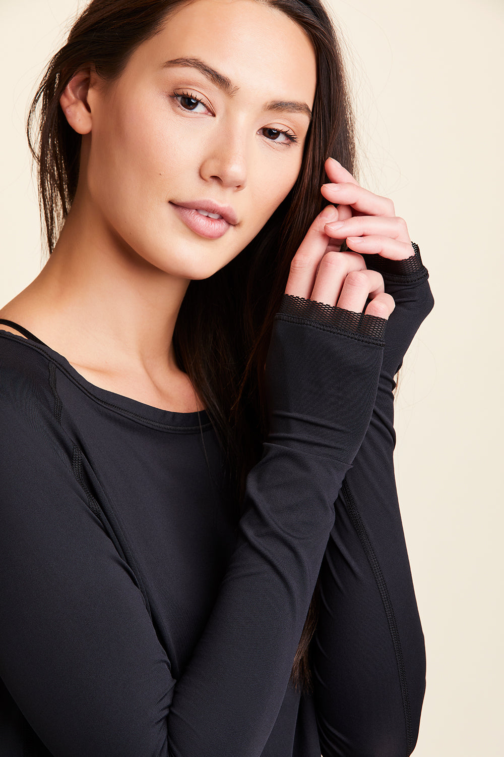 Front view close-up of Alala Women's Luxury Athleisure black long sleeve tee