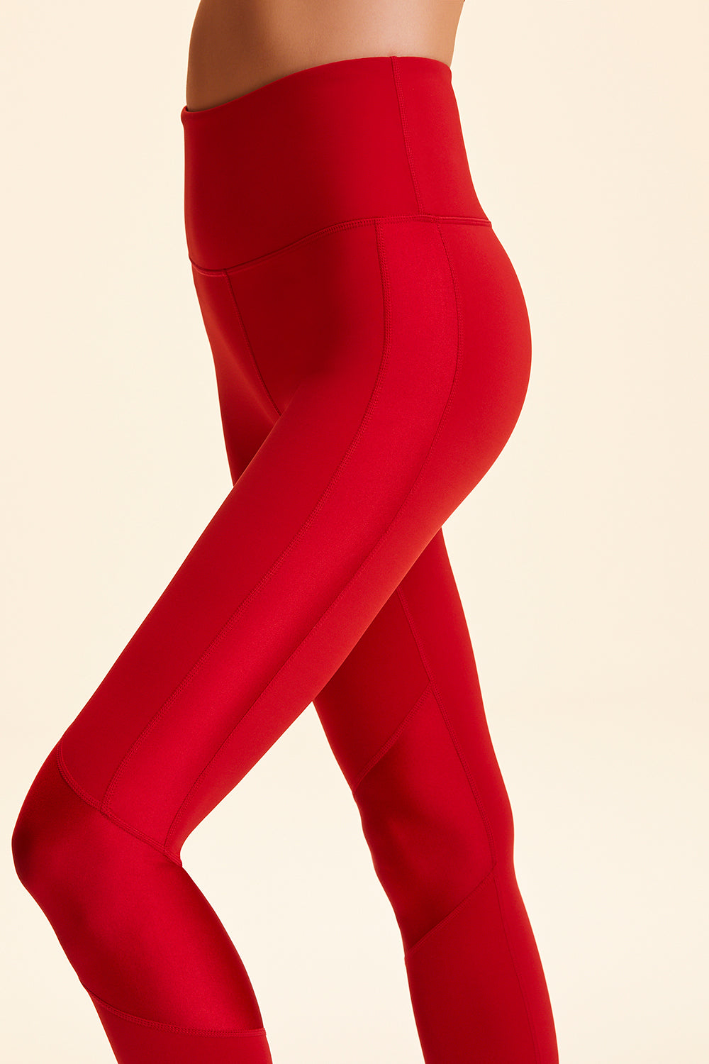 Side view of Alala Women's Luxury Athleisure red tight