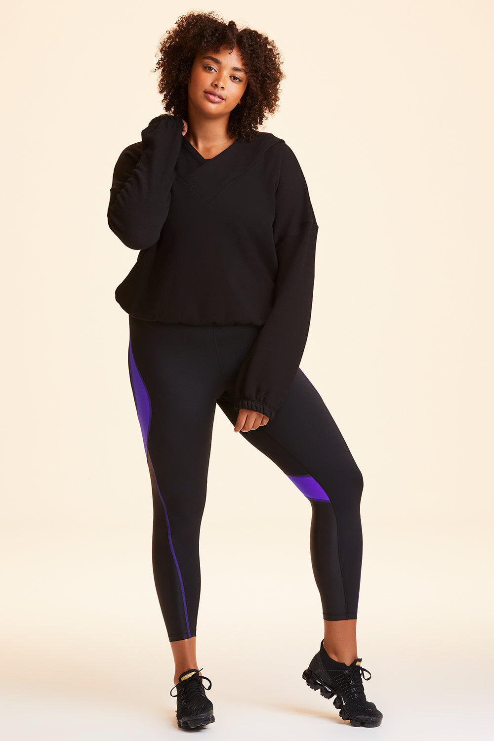 Front view of Alala Women's Luxury Athleisure black cropped sweatshirt in plus size