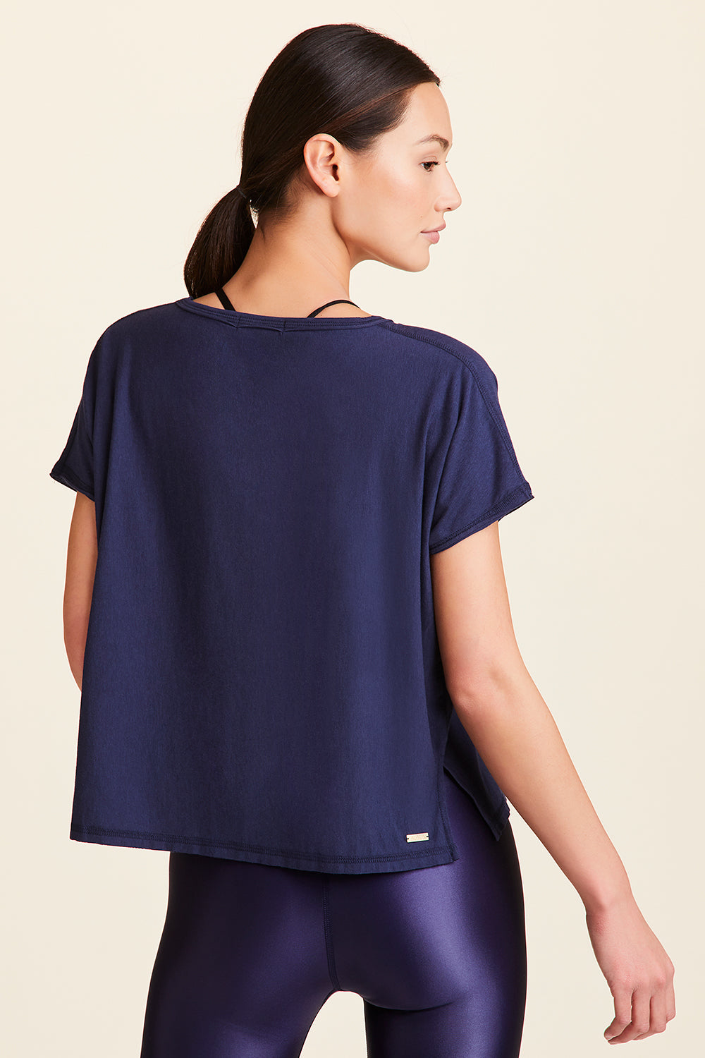 Back view of Alala Women's Luxury Athleisure super-soft tee in solid Navy