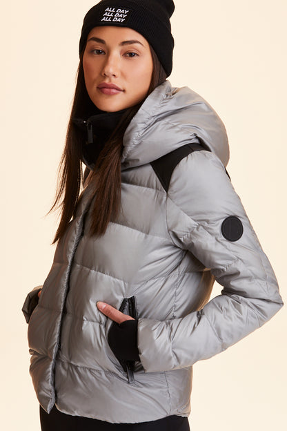 3/4 view of Alala Women's Luxury Athleisure silver puffer jacket
