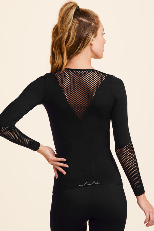 Back view of Alala Women's Luxury Athleisure black seamless long sleeve with mesh detailing