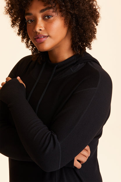 Front view of Alala Women's Luxury Athleisure black hoodie in plus size