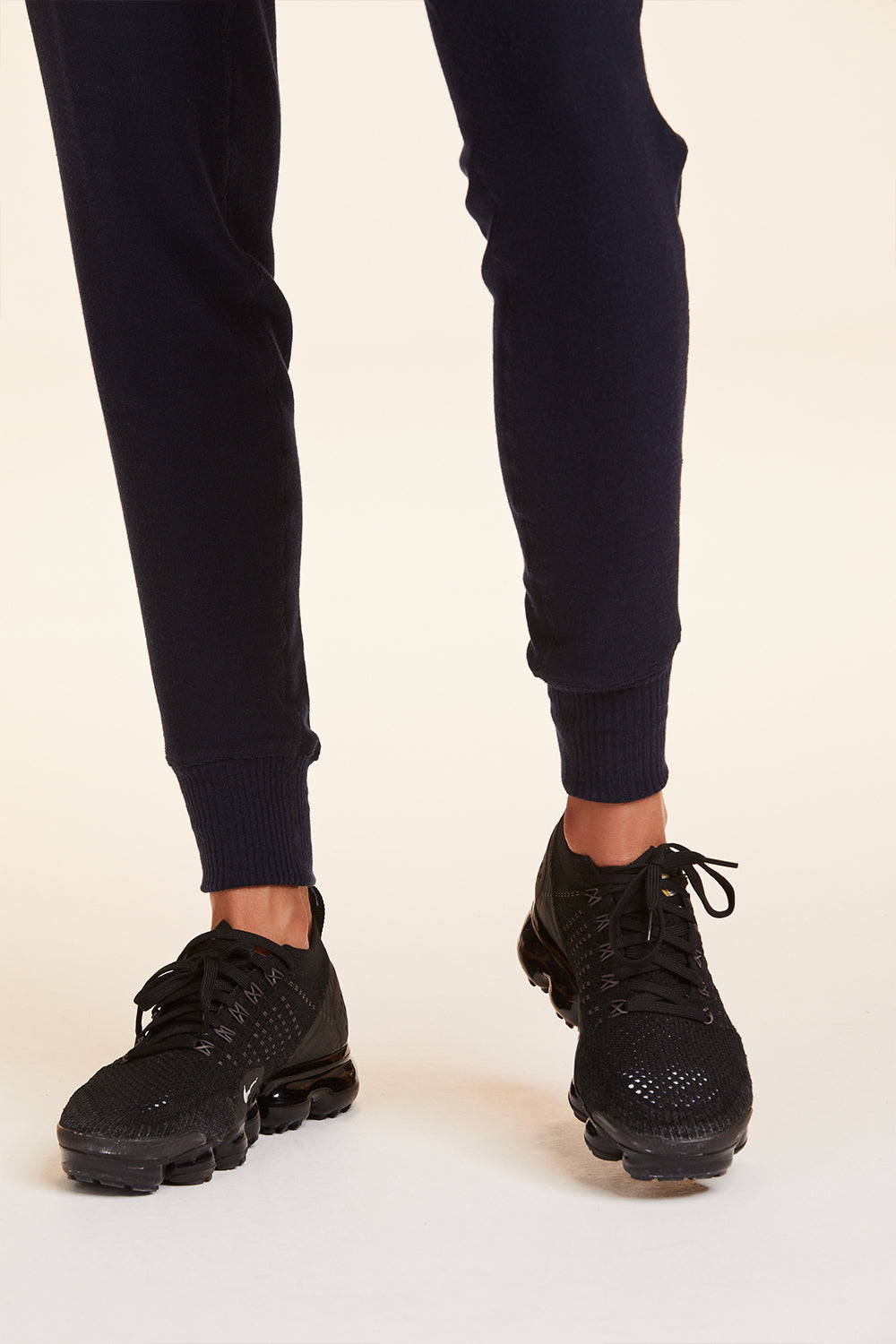 Front  view of Alala Women's Luxury Athleisure navy sweatpant