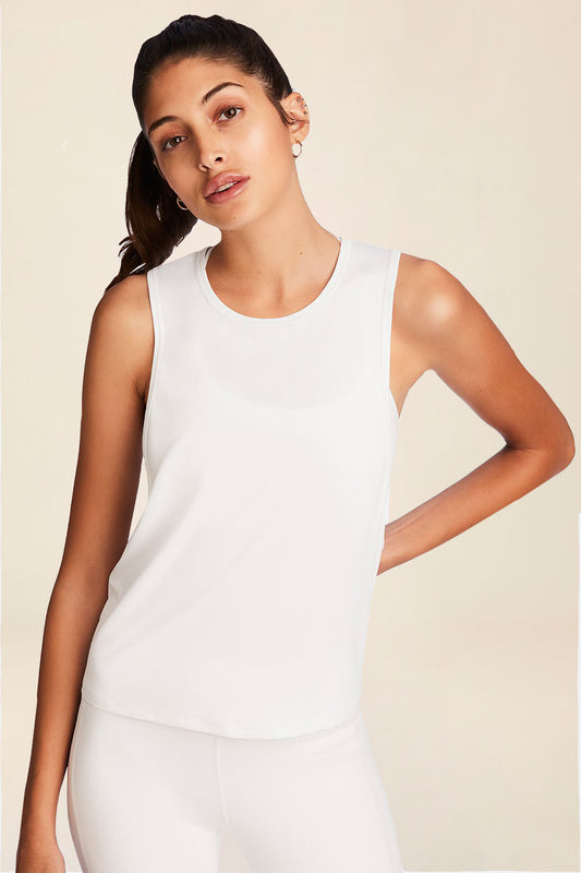 Front view of Alala Women's Luxury Athleisure mesh tie back tank in white