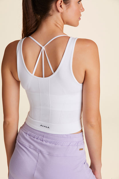 Back view of Alala Women's Luxury Athleisure seamless crop tank in white