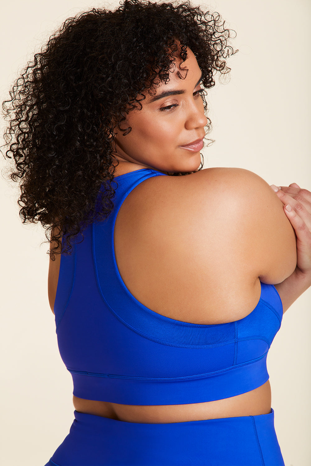Back view of Alala Luxury Women's Athleisure vamp bra in cobalt blue with racerback fit in plus size