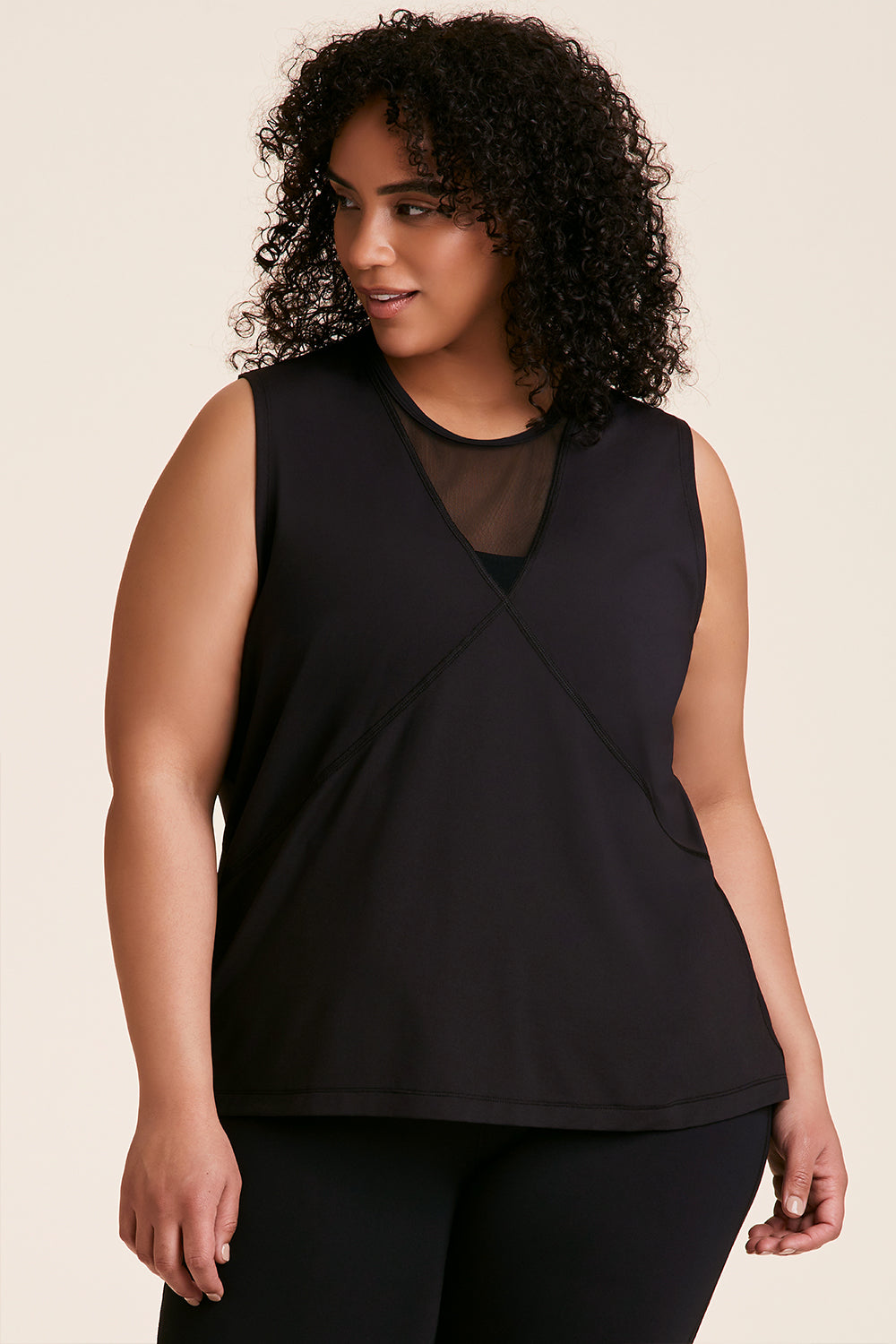 Front view of Alala Women's Luxury Athleisure black tank in plus size